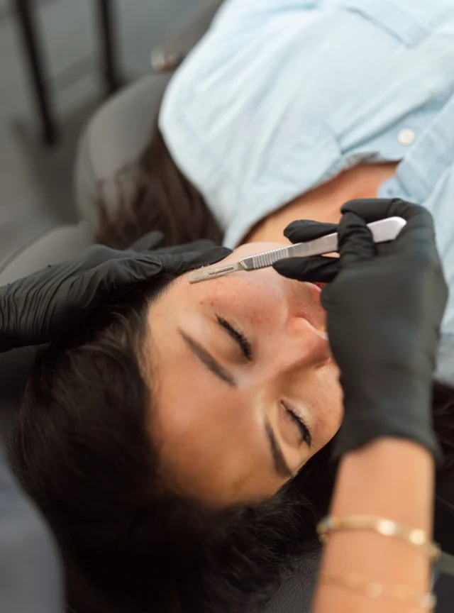 Professional dermaplaning is about a lot more than removing peach fuzz.  When performed correctly, dermaplaning gently exfoliates the surface of the skin by removing dead skin buildup and vellus hair, helping products absorb more effectively while leaving skin smoother, brighter, and more refined.  It can also help improve makeup application, support overall skin texture, and give skin that fresh, polished look people love.  The difference is technique, safety, and precision.  Professional dermaplaning is performed using medical-grade tools and a trained understanding of skin health, pressure, angle, and contraindications. Using an at-home razor incorrectly can lead to irritation, cuts, barrier damage, and inflammation, especially on sensitive or acne-prone skin.  Just because something can be done at home doesn’t mean it should be.  Healthy, glowing skin starts with the right approach.